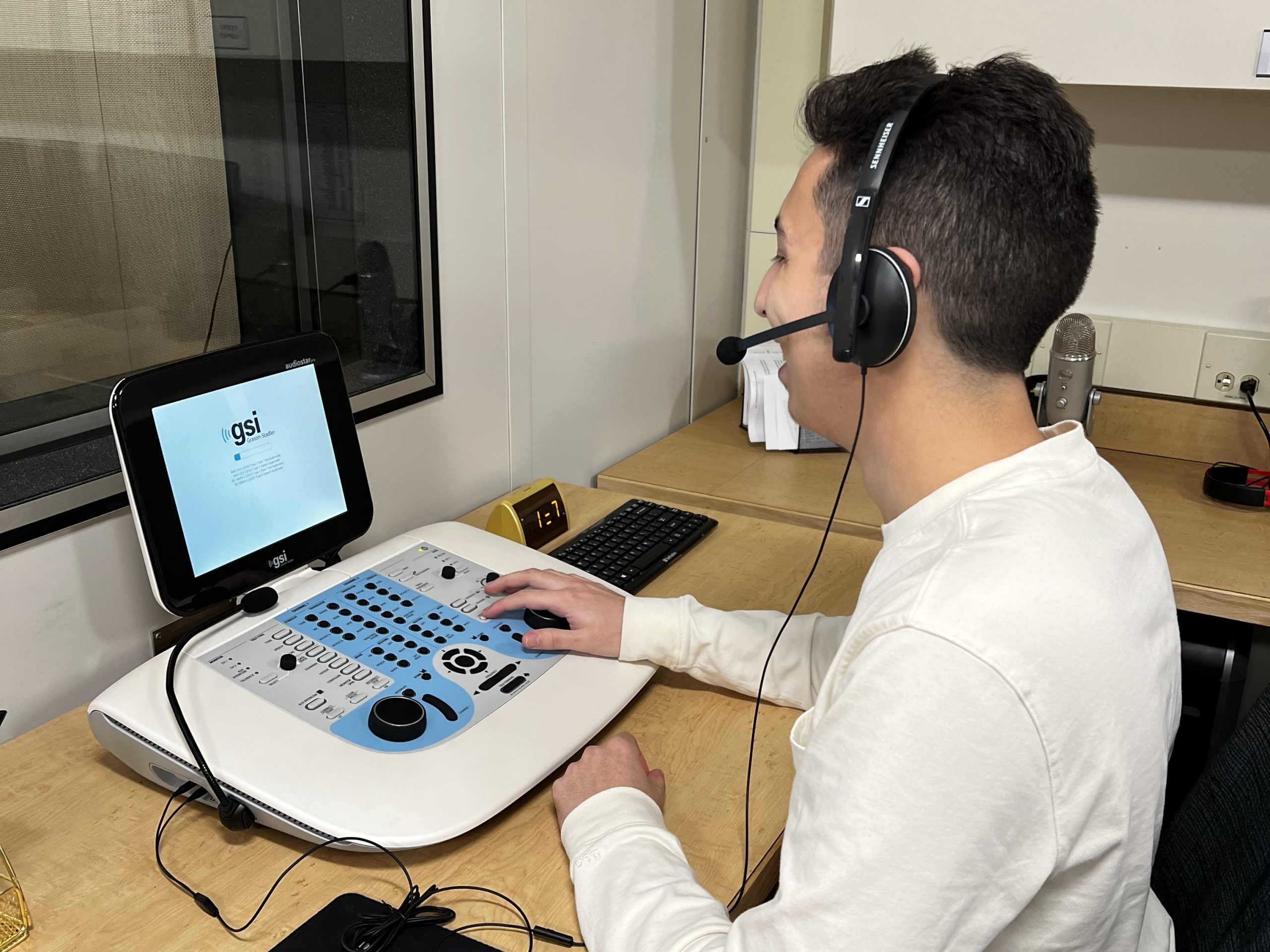 laba Student working at an audiometer in the AR lab